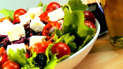 stock-footage-tempting-selection-of-fresh-crisp-salad-mozarella-cheese-oils-making-a-healthy-nutritious-meal